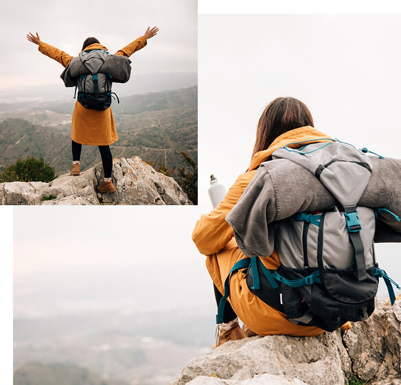 Group of hikers carrying backpacks while climbing a mountain trail