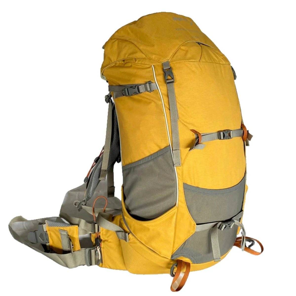 Yellow and gray hiking backpack shown from the side with padded hip belt and multiple compression straps