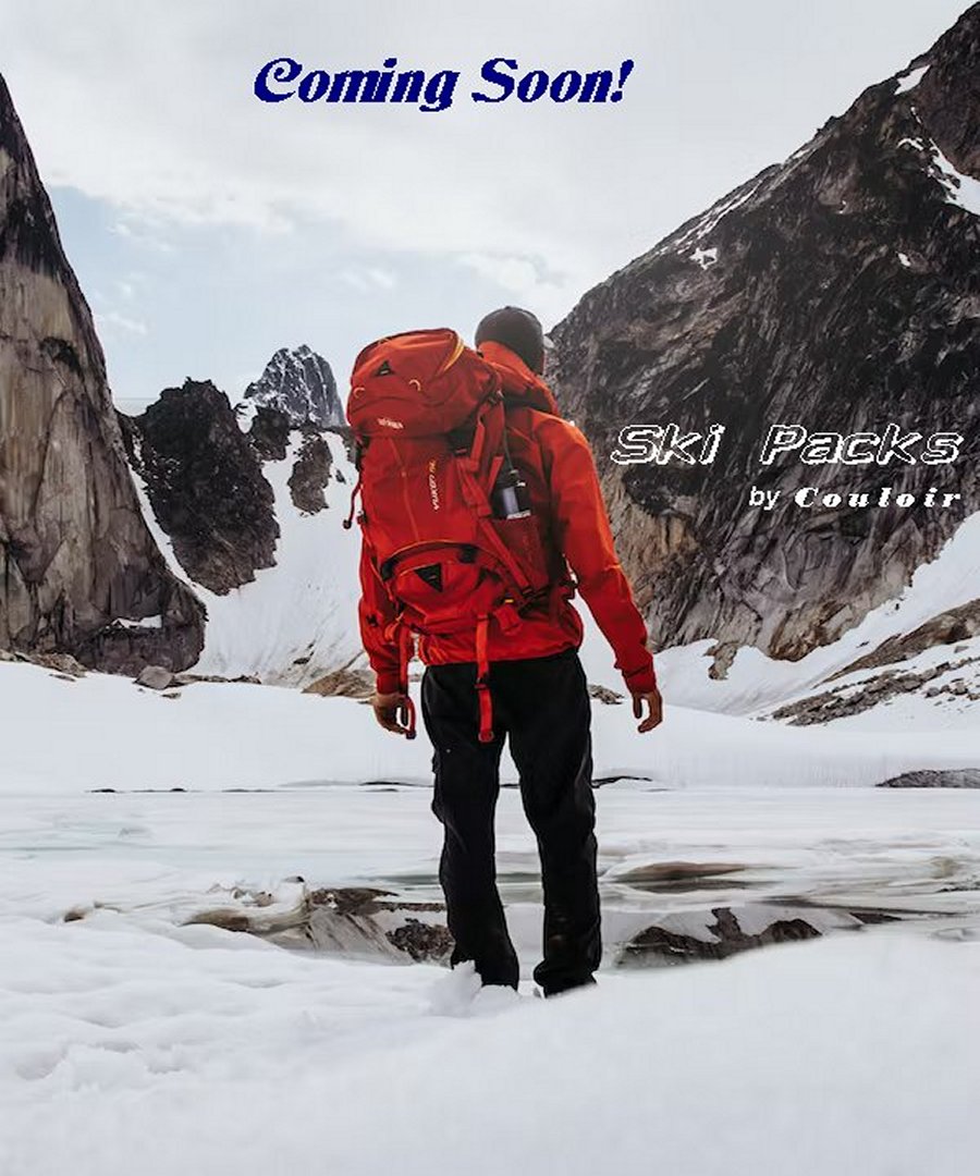 Backpacker wearing Couloir brand pack while hiking in winter 